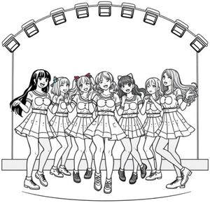 idol club of nine dancing on stage all very cute members wearing cute kawwai stuff